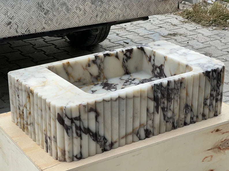 Calacatta Viola marble sink ribbed 3 Sides