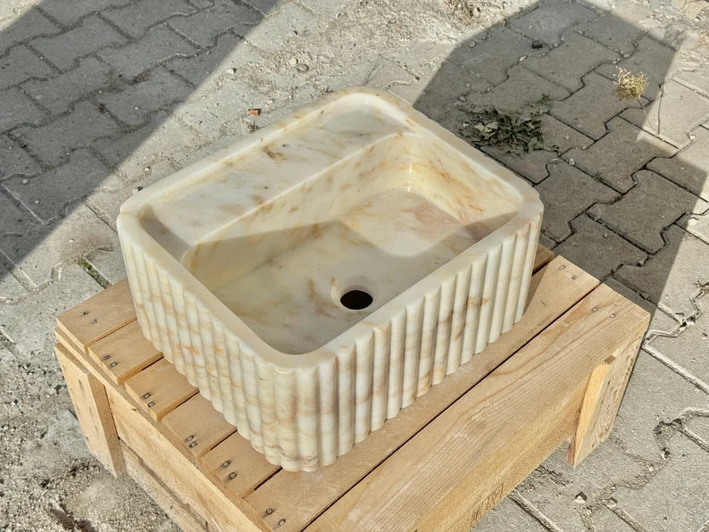 Lorenzo Calacatta ribbed Gold marble sink