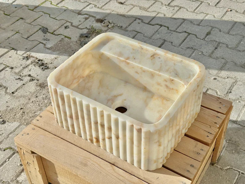 Lorenzo Calacatta ribbed Gold marble sink