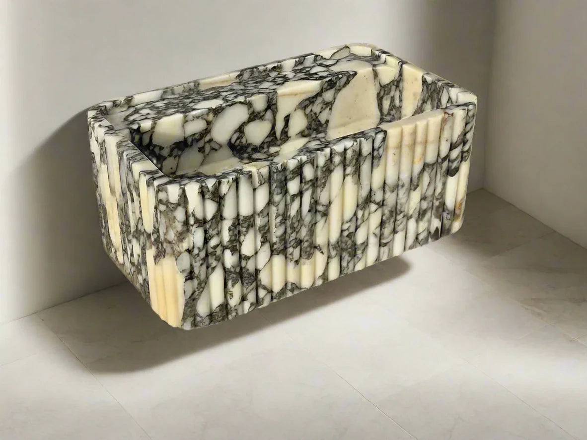 Armani ribbed Calacatta Viola marble sink