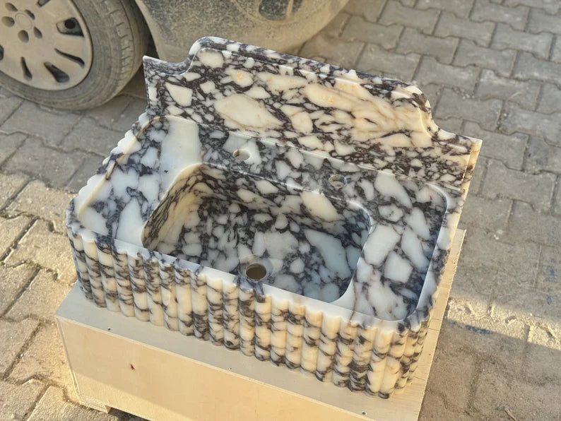 Elodie Calacatta viola backsplash marble sink