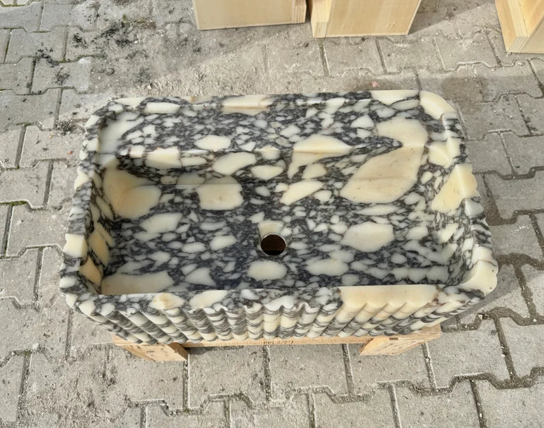 Armani ribbed Calacatta Viola marble sink