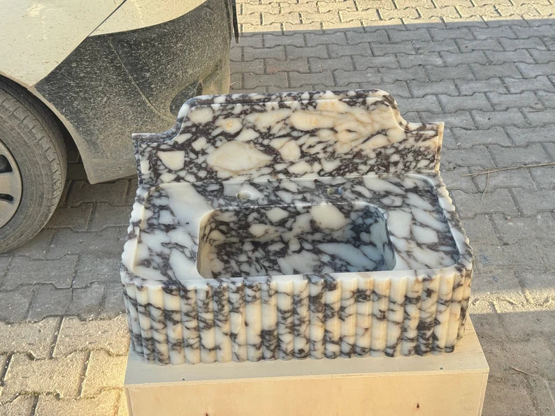 Elodie Calacatta viola backsplash marble sink