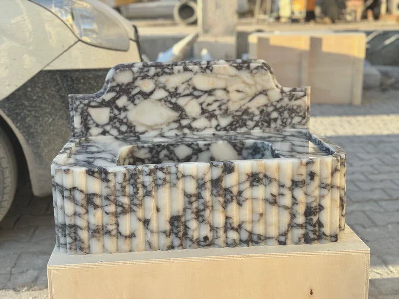 Elodie Calacatta viola backsplash marble sink