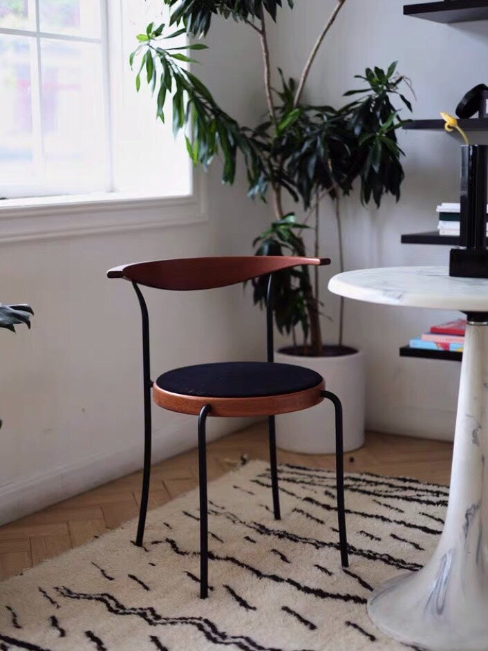 Partout Chair by Rud Thygesen and Johnny Sørensen