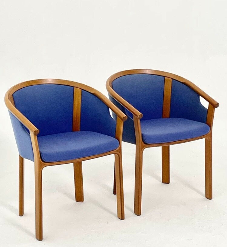 Teak Dining Chairs Inspired by Wine Barrel Design