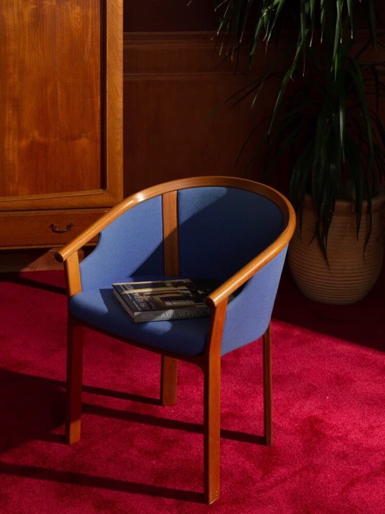 Teak Dining Chairs Inspired by Wine Barrel Design
