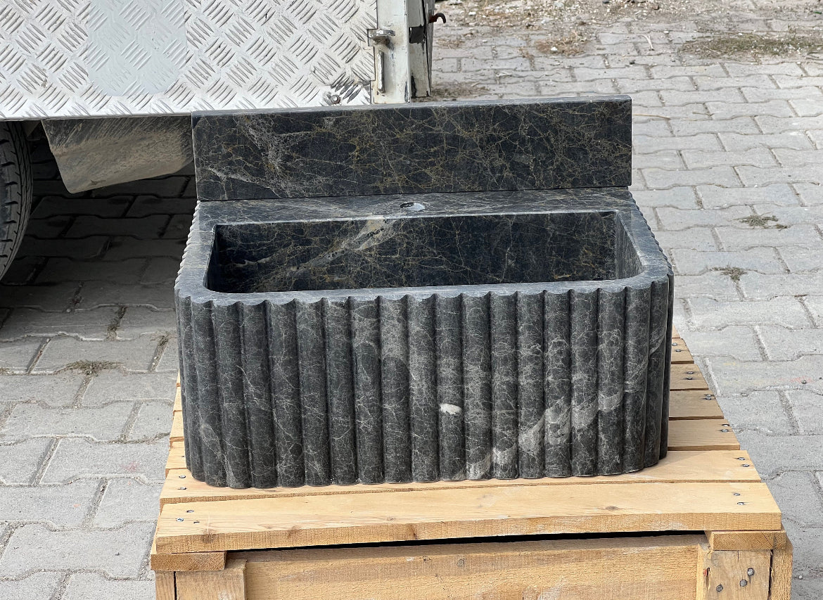 Bianca Black ribbed Bayat backsplash marble sink