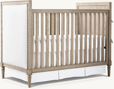 Artisan Crafted Convertible Baby Crib: Upholstered Headboard, Nailhead, Distressed Mahogany
