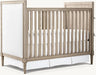 Artisan Crafted Convertible Baby Crib: Upholstered Headboard, Nailhead, Distressed Mahogany
