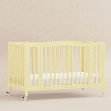 Safe, Stylish Foldable Teak Baby Crib with Wheels for Nursery