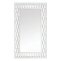 White decorative mirror with lattice design on a white background