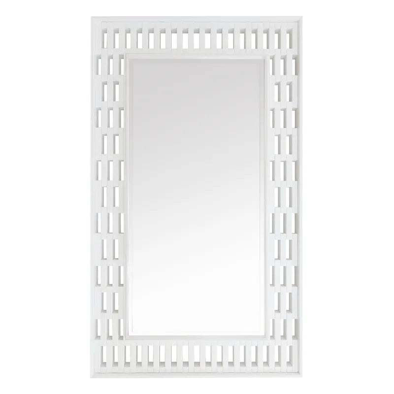 White decorative mirror with lattice design on a white background