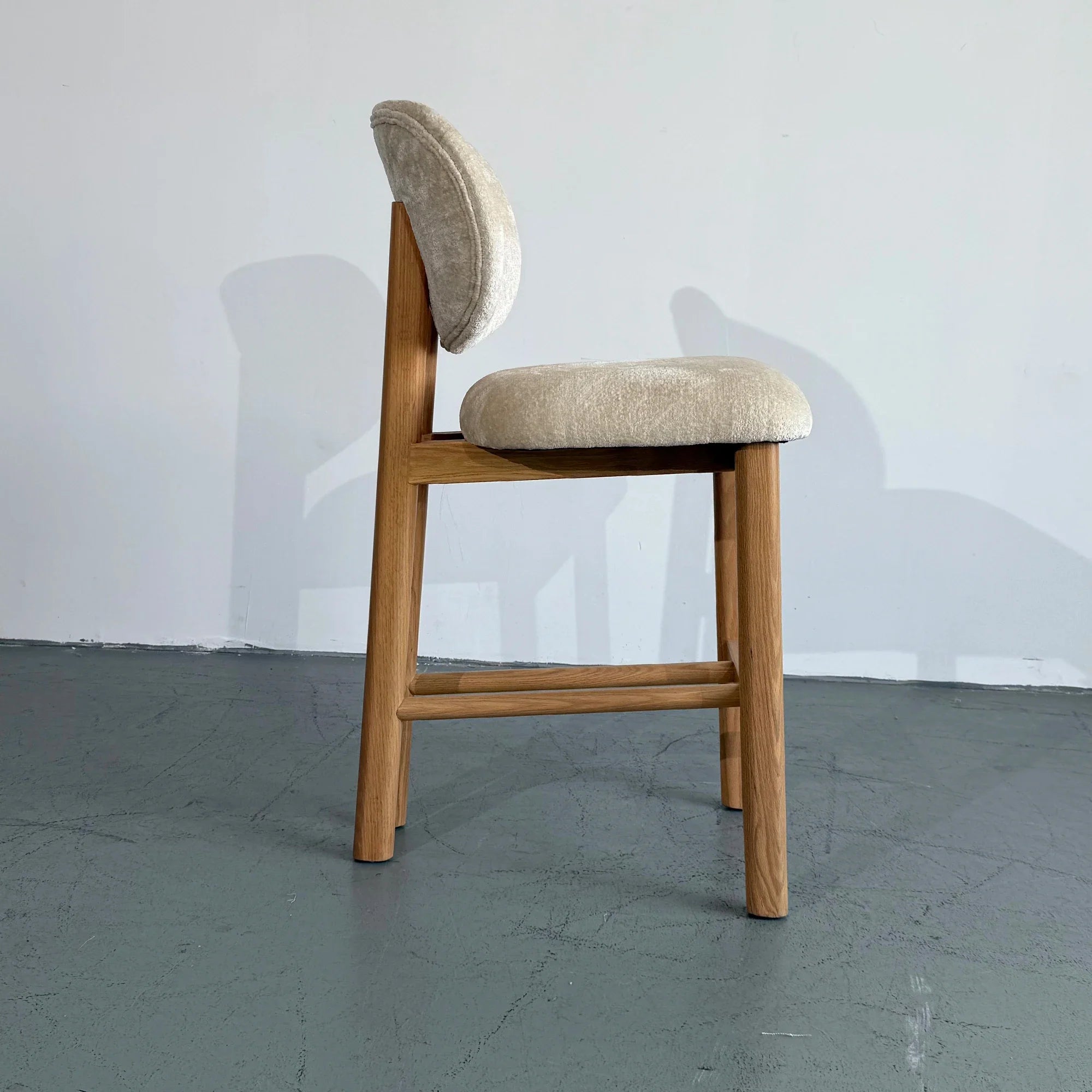 Chic Beige Upholstered Curved Kitchen Stool with Solid Oak Exposed Back