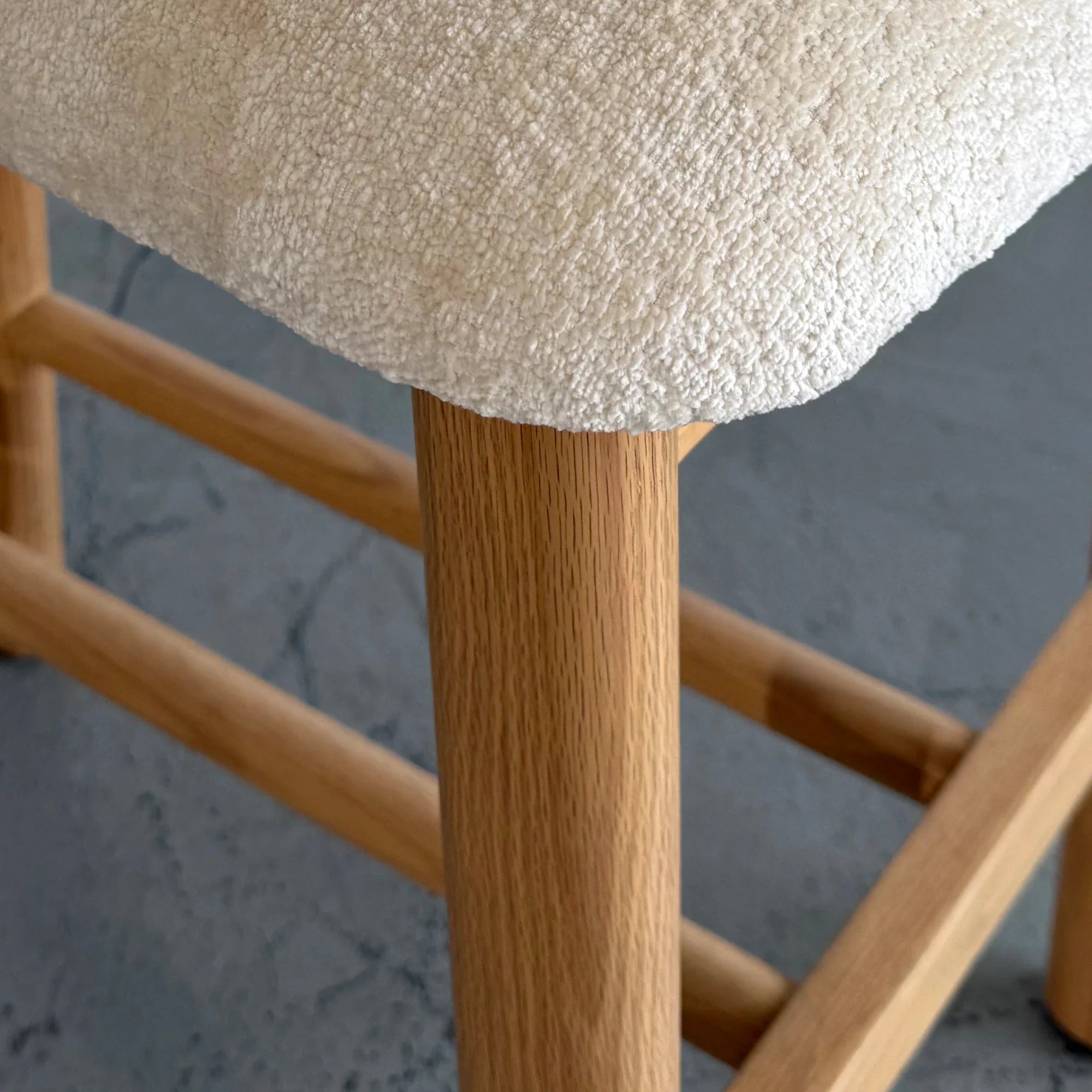 Chic Beige Upholstered Curved Kitchen Stool with Solid Oak Exposed Back