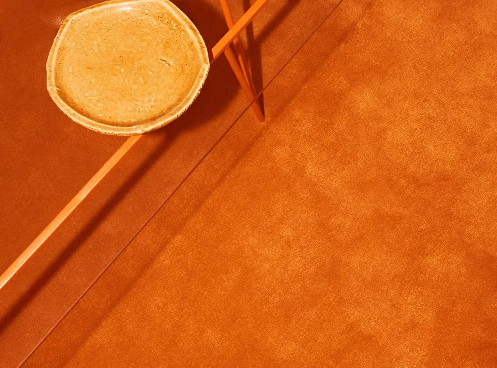 Azélie Handmade Solid Color Orange Carpet – Custom Design for Luxury Living