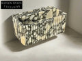 Armani ribbed Calacatta Viola marble sink