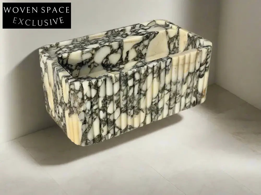 Armani ribbed Calacatta Viola marble sink