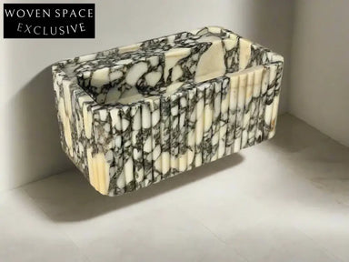 Armani ribbed Calacatta Viola marble sink