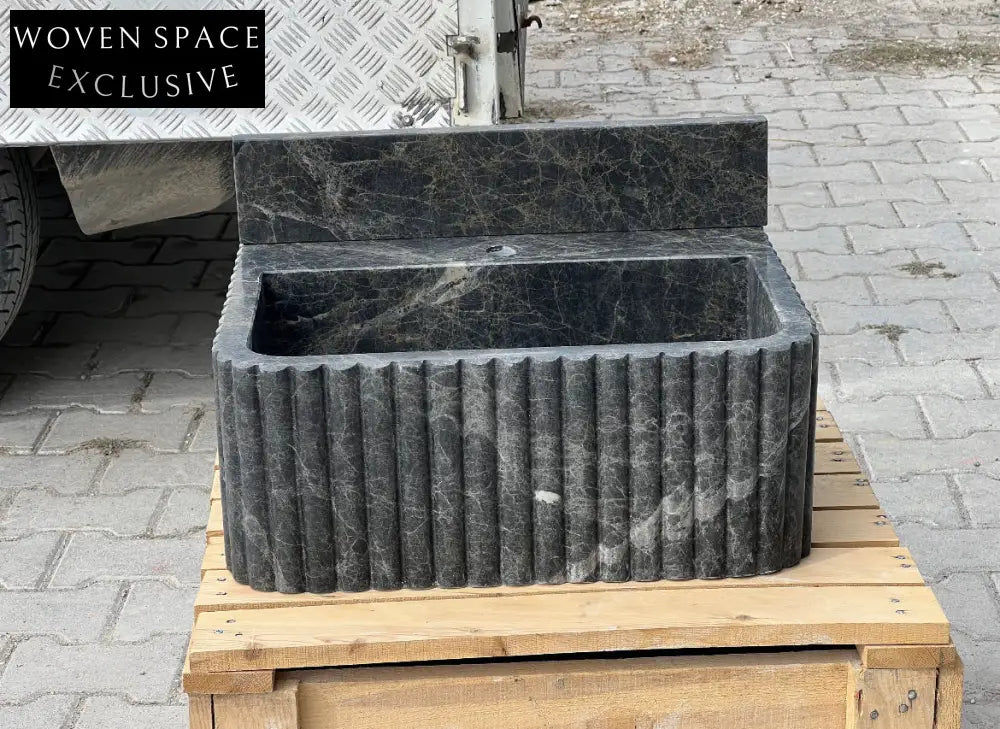 Bianca Black ribbed Bayat backsplash marble sink