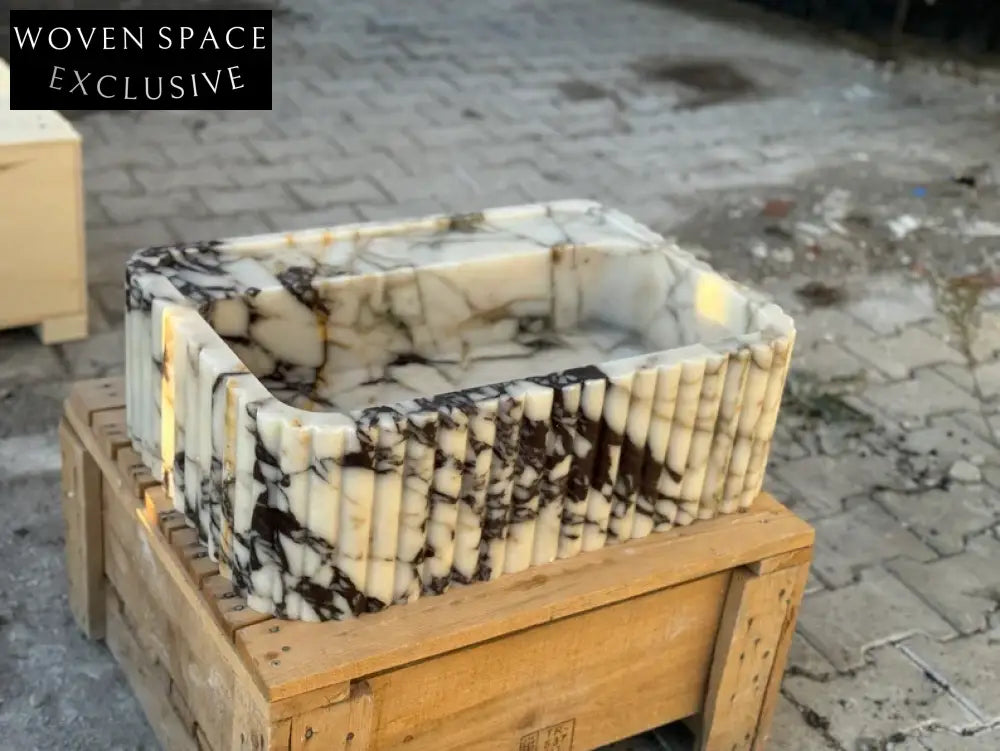 Calacatta Viola marble sink ribbed 3 Sides