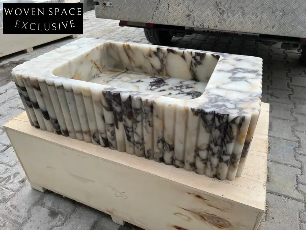 Calacatta Viola marble sink ribbed 3 Sides