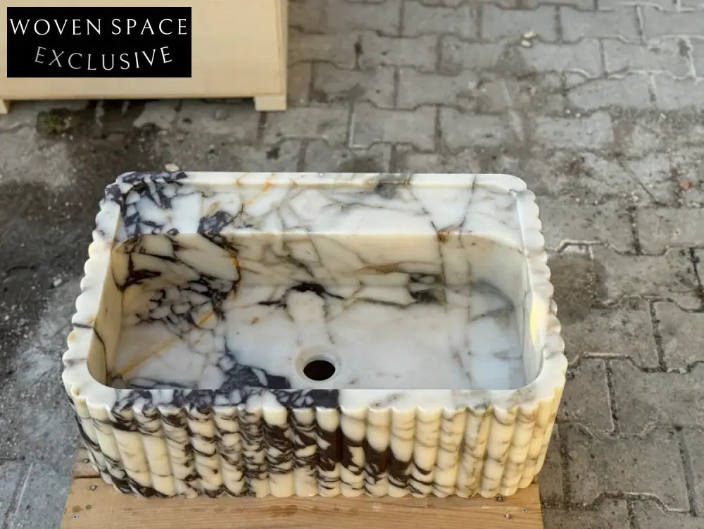 Calacatta Viola marble sink ribbed 3 Sides