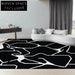 Chic Abstract Black & White Wool Rug for Modern Living Spaces