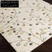 Chic Handmade Cream Geometric Area Rug for Modern Living Spaces