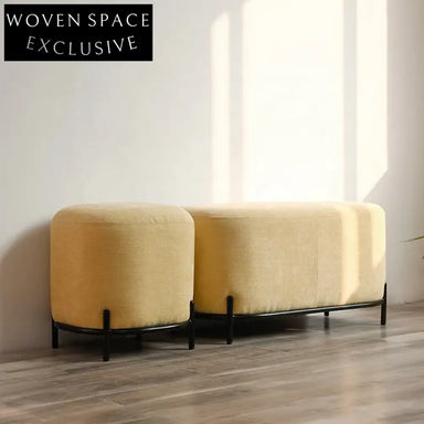 Chic Round Fabric Ottoman Stool with Black Metal Legs for Modern Spaces