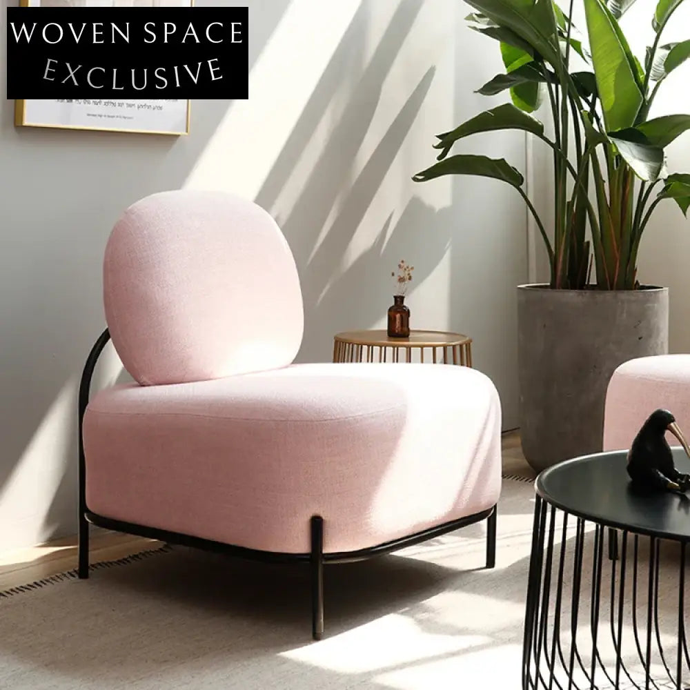 Chic Round Fabric Ottoman Stool with Black Metal Legs for Modern Spaces