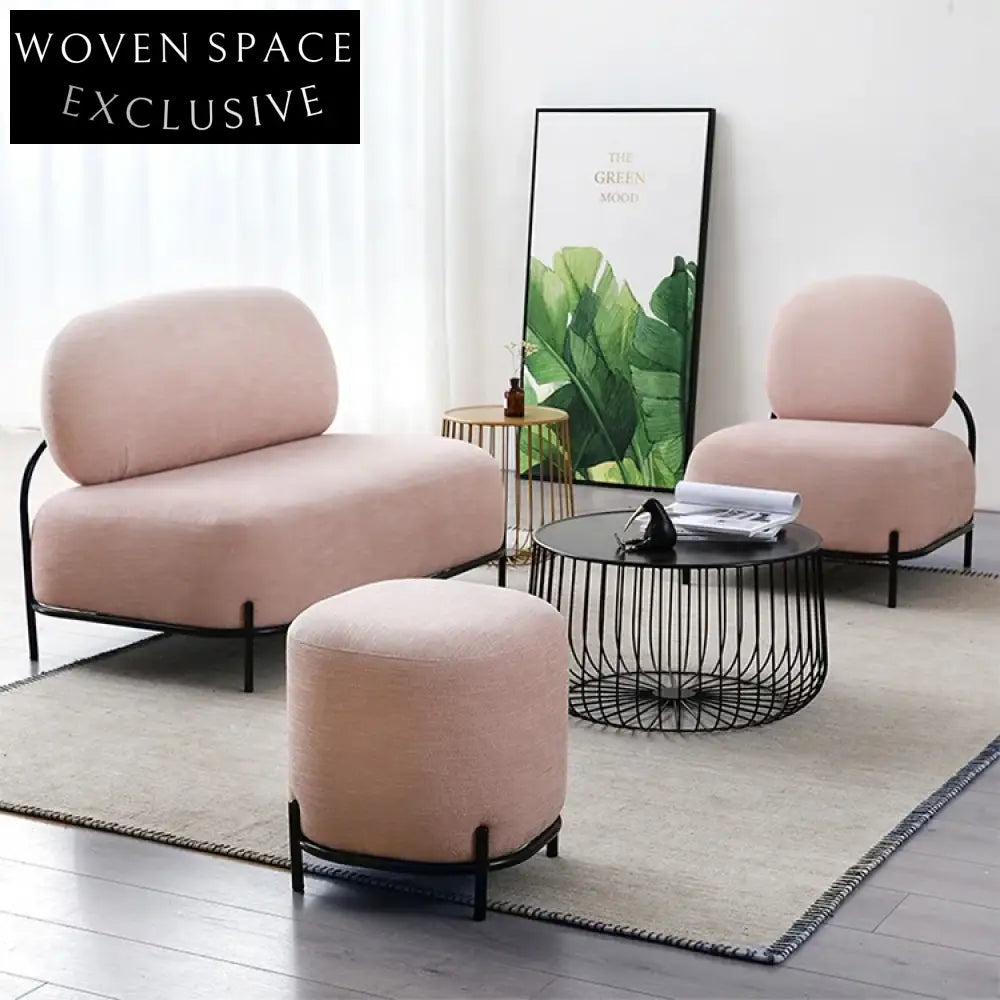 Chic Round Fabric Ottoman Stool with Black Metal Legs for Modern Spaces