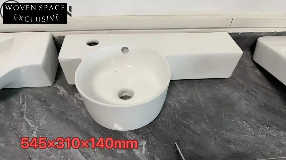 Compact Oval Wall Hung Ceramic Hand Wash Basin for Small Bathrooms