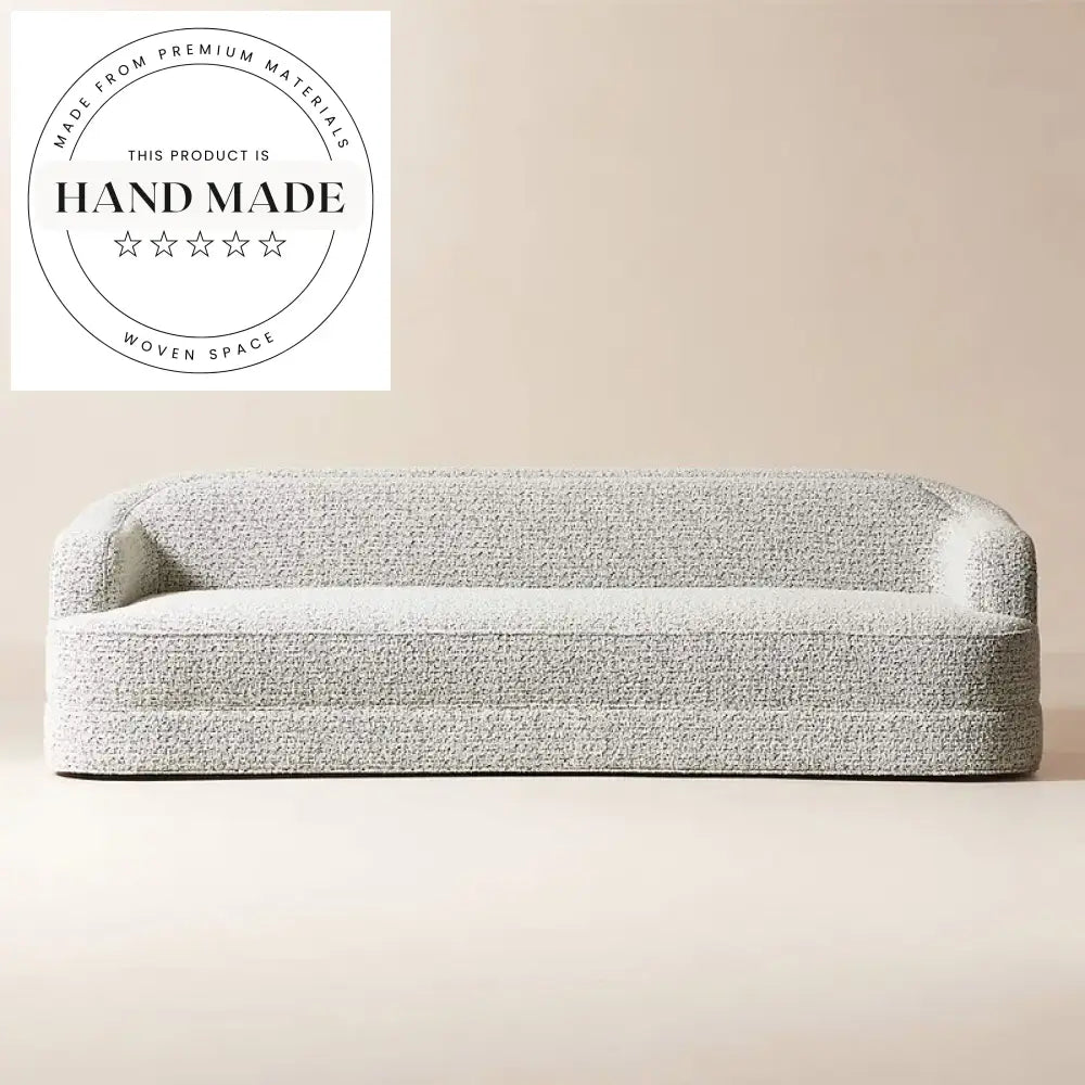 Elegant Curved Black and White Boucle Fabric Four Seater Sofa