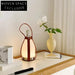 Elegant Glass Bottle LED Lamp, Leather Base for Modern Home Decor