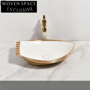 Elegant Gold Ceramic Oval Countertop Wash Basin with Golden Line Art