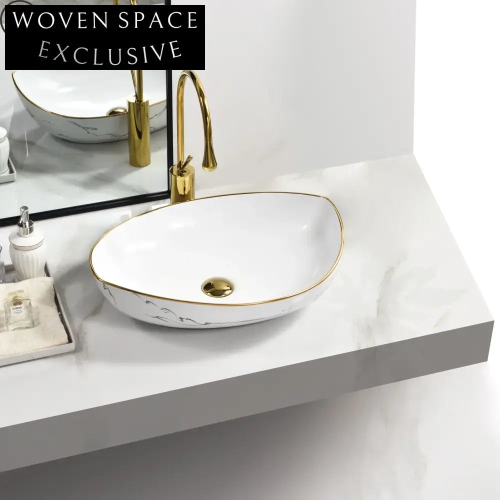 Elegant Gold Ceramic Oval Countertop Wash Basin with Golden Line Art