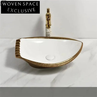 Elegant Gold Ceramic Oval Countertop Wash Basin with Golden Line Art