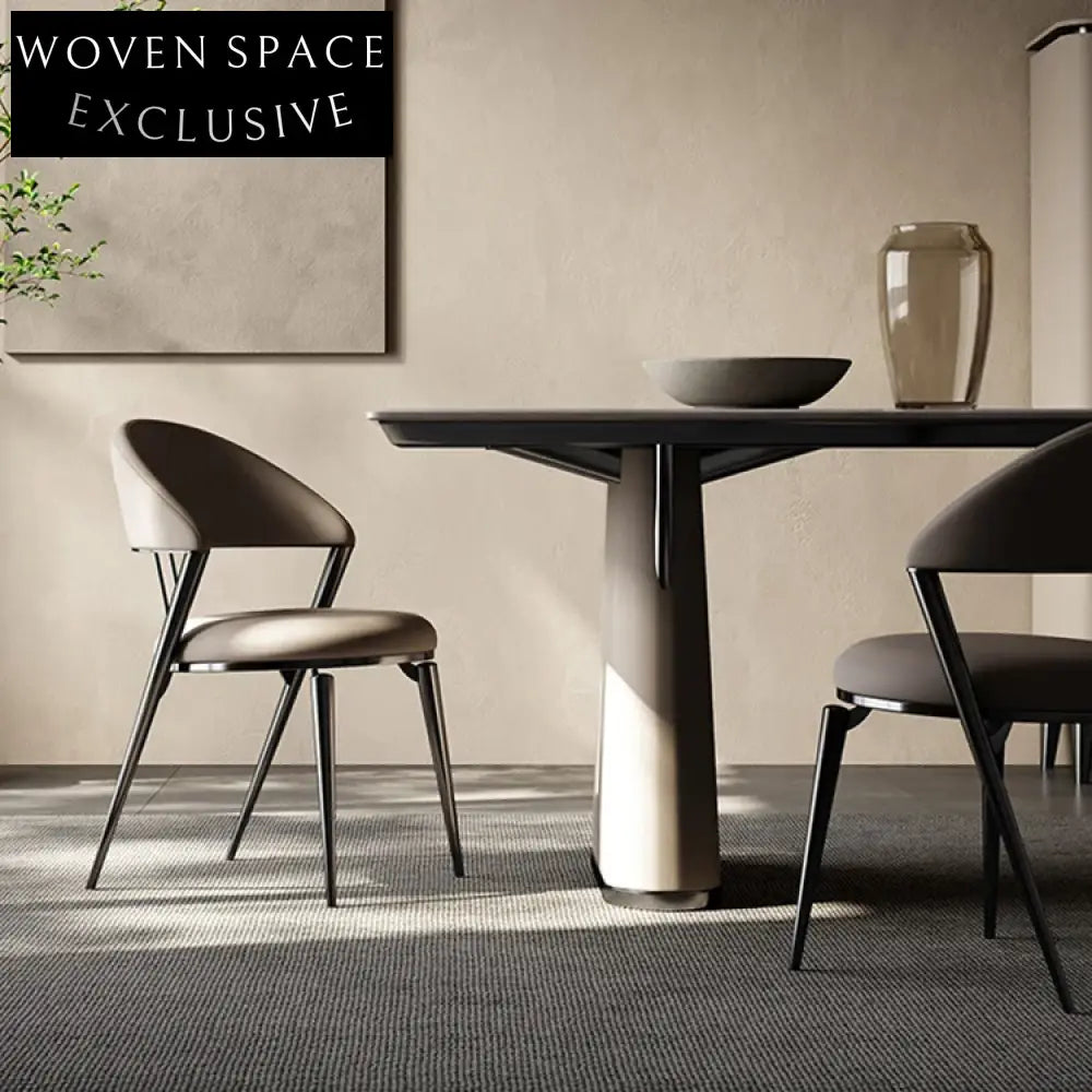 Elegant Modern Dining Chair with Curved Backrest, Stainless Steel Frame, PU Leather
