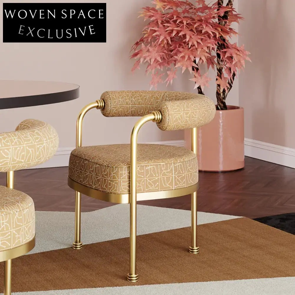 Elegant Pink Velvet Dining Chair with Gold Legs and Comfortable Armrests
