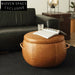 Elegant Round Leather Top Solid Wood Coffee Table for Modern Living Spaces