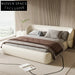 Elegant Upholstered King Size Bed with Curved Headboard