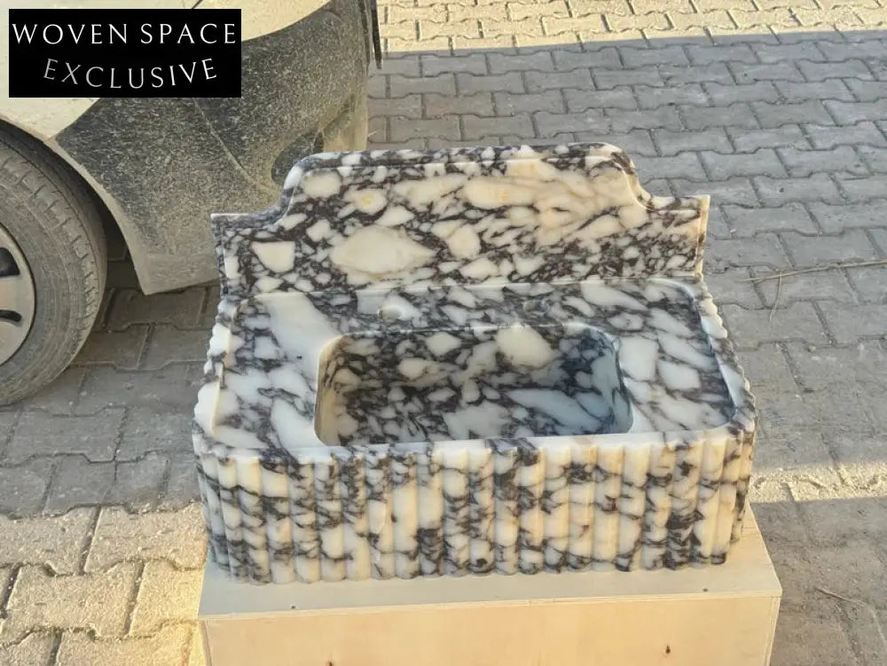 Elodie Calacatta viola backsplash marble sink