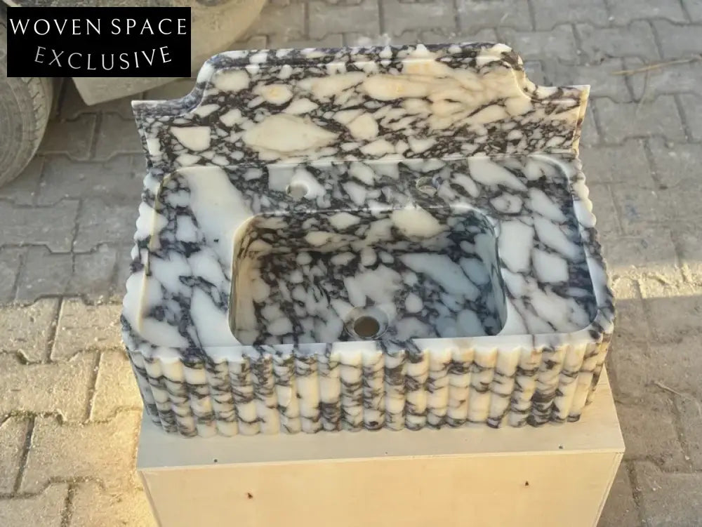 Elodie Calacatta viola backsplash marble sink