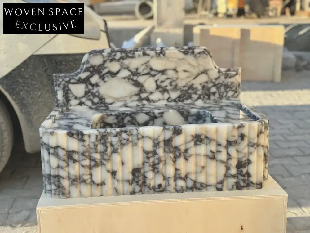 Elodie Calacatta viola backsplash marble sink