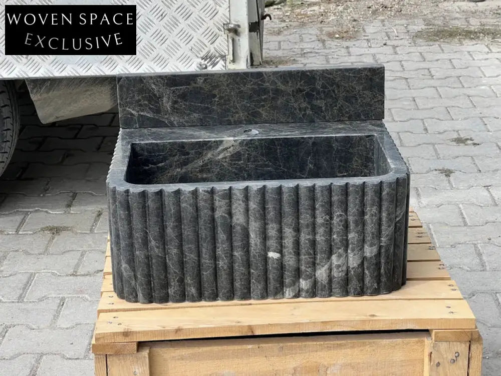 Giovanni Black Bayat ribbed backsplash marble sink