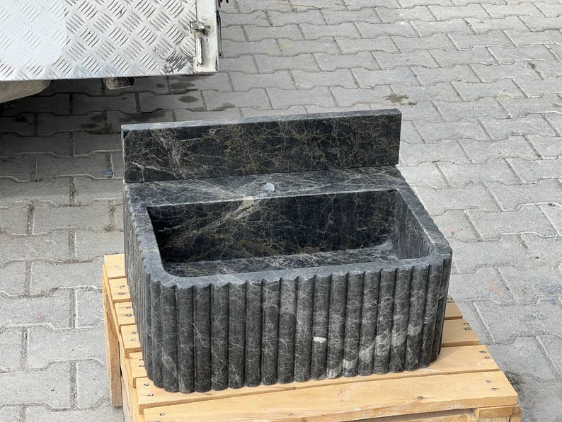 Giovanni Black Bayat ribbed backsplash marble sink