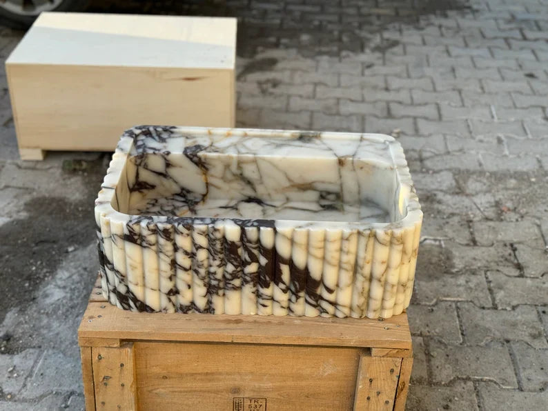 Calacatta Viola marble sink ribbed 3 Sides
