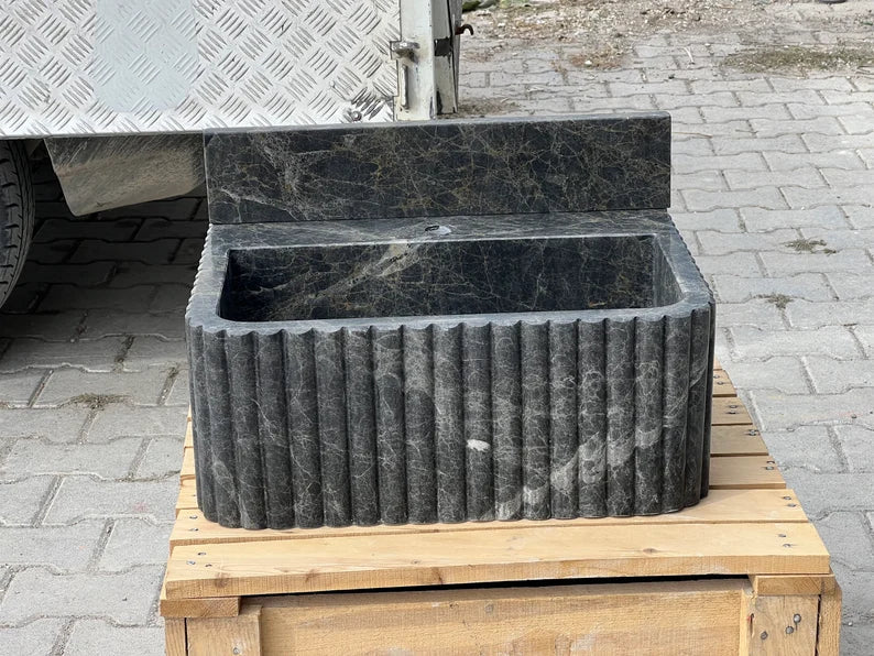 Giovanni Black Bayat ribbed backsplash marble sink