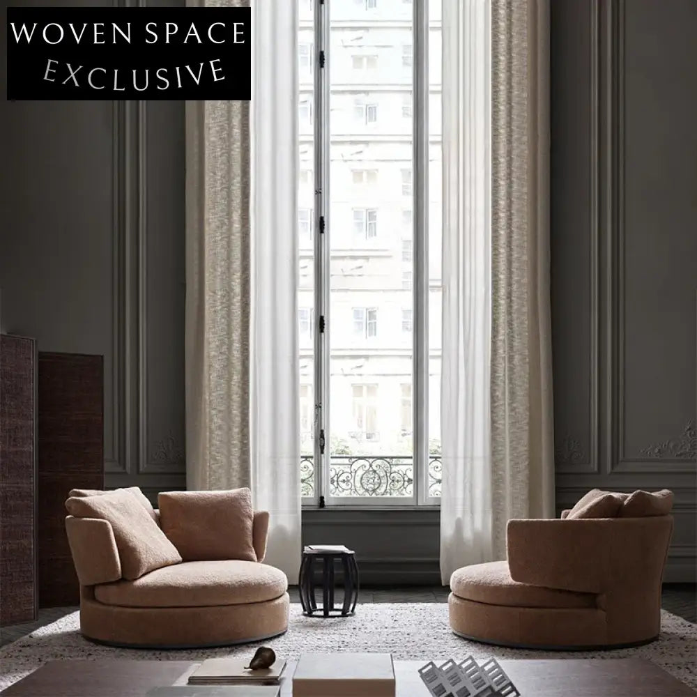 Luxurious Italian Fabric Lounge Chair with Round Design and Low Armrest Cushion